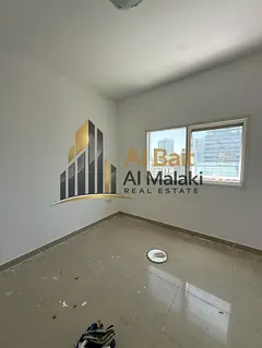 Tow bedrooms and a living room in Al Taween with and open view-closed services