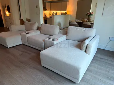 Large Beige Sofa with electric Cup Holders and magnetic charger.