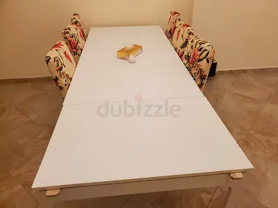 White Extendable Dining Table with 6 ikea Chairs with floral and 3 others colours available.