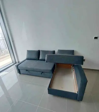 IKEA L shap Sofa store cum bed you can fix the storage lift or Right