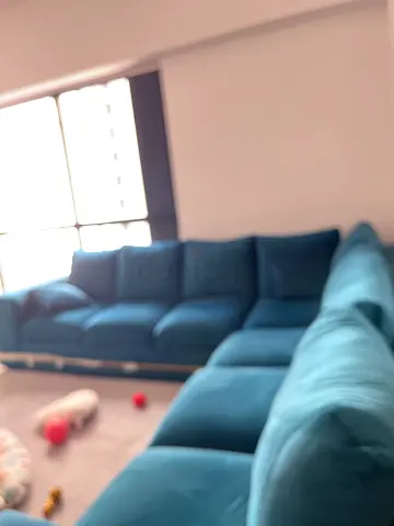 Teal velvet 7-seater sectional sofa in good condition