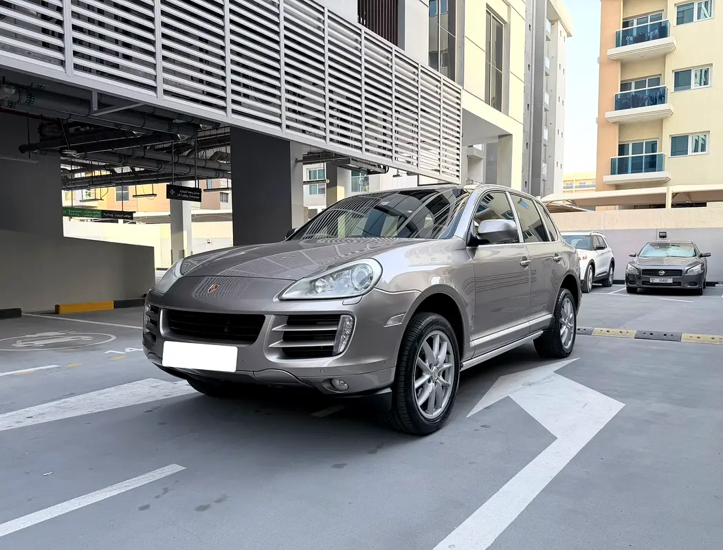 Porsche Cayenne 2009 — photo 1 of 15