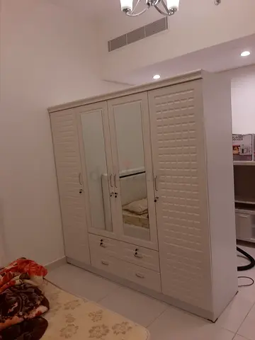 White 4Door Wardrobe with Mirror and Drawers - Good Condition