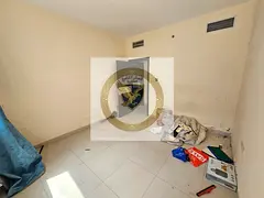 Two-bedroom apartment for rent with a living room and free parking, easy access to Dubai in Al Taawu