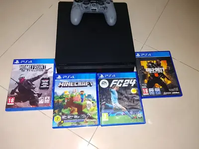playstation 4 slim with controller and 4 cd each cd cost 60