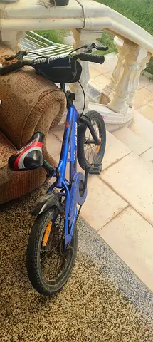 Blue kids bicycle - used, good for 4 years