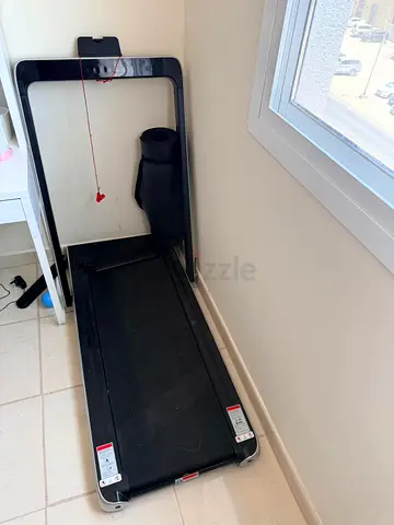 Compact foldable treadmill - barely used, good condition