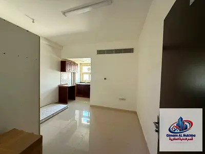 Studio apartment for rent in Al Qulaya, Sharjah. Neat finishing, prime location near Lulu Hypermarket, Nesto supermarket, and City Centre. Rent is AED