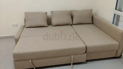 Ikea Beige L-shaped Sofa Bed with Removable Cushions