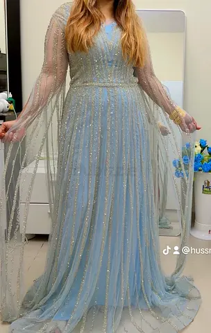 Light Blue Sequin Evening Gown with Sheer Long Sleeves