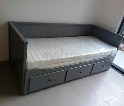 IKEA Hamnes Day bed with 3 storage drawers underneath and with 2 IKEA mattresses is available in exc