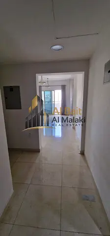 For annual rent: A spacious and well-maintained 2-bedroom apartment in Al Taawun, directly on the D