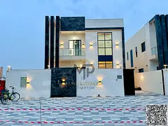 For sale: Luxurious modern villa with 4 master bedrooms and a spacious yard in Ajman, including regi