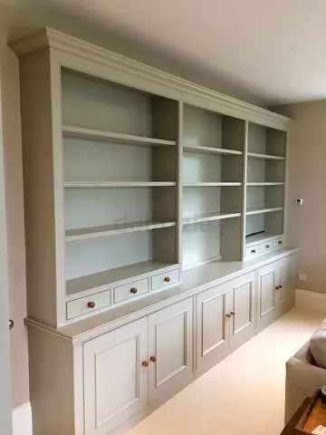 Custom Built-In White Wooden Bookcase with Lower Cabinets