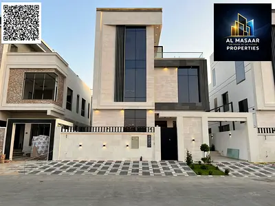 Modern villa in Al Yasmin, two floors and a roof, in a prime location, freehold ownership for all n