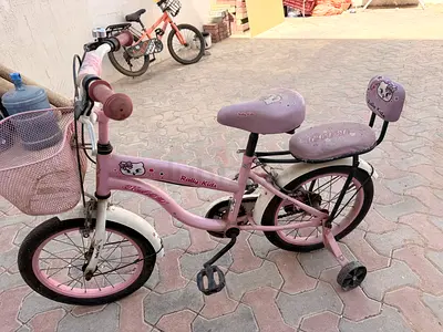 Used Pink Kids Bicycle with Training Wheels and Basket