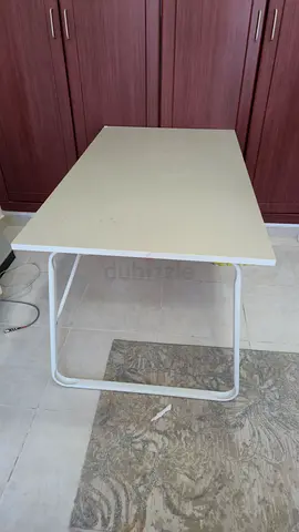 Simple white folding table with metal frame - good condition
