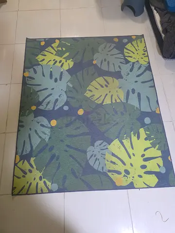 IKEA tropical leaf patterned area rug - good condition