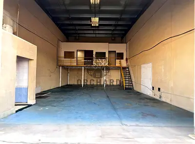 1500 SQFT WAREHOUSE/SUITABLE FOR CAR OR BIKE GARAGE/ELECTRICITY POWER 3 PHASE/PRIME LOCATION ON THE MAIN ROAD/ATTACHED OFFICE - WASHROOM/RENT 100000