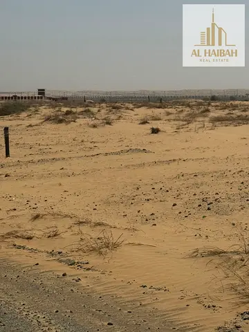 📢 للبيع أرض تجارية مميزة – روضة القرط (الشارقة)