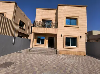 Villa for rent in Al Muwaihat area. It consists of four bedrooms, a majlis (formal sitting room), a living room