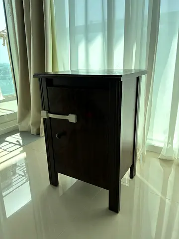Elegant dark wood bedside table / nightstand