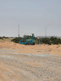Prime commercial land for sale in Al-Malha, strategic location, ground and four-floor permit