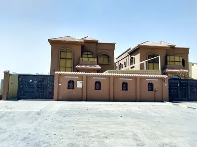 Villa for rent in Al Rawda 1 area. It consists of five bedrooms, a majlis (formal sitting room), a living room,