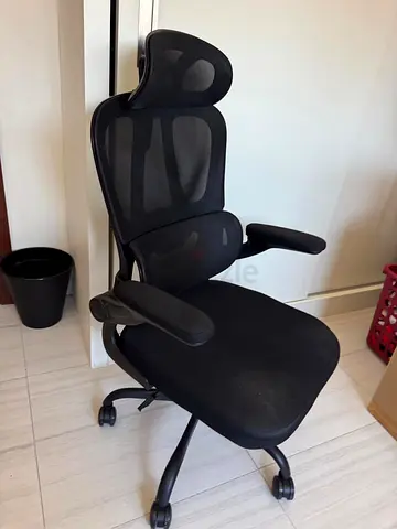 Ergonomic Black Mesh Office Chair with Headrest and Adjustable Armrests