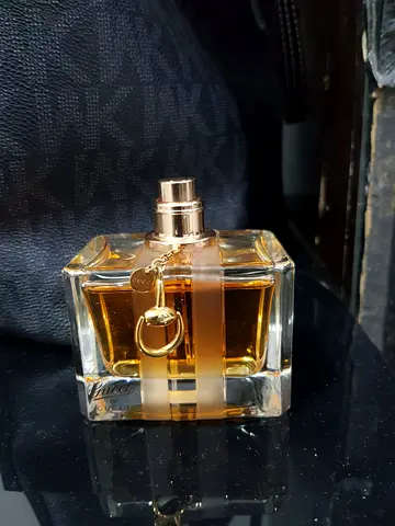 Used womens perfume bottle - nearly full