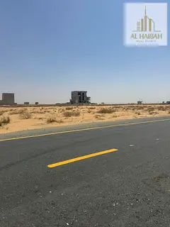 For sale: a corner residential land in the Rawdat Al-Qurt area, featuring a strategic location and d