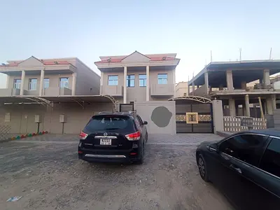 For rent in Al Zahia: a villa with 3 bedrooms, a living room, a kitchen, a maid's room, and an outdoor seating area.