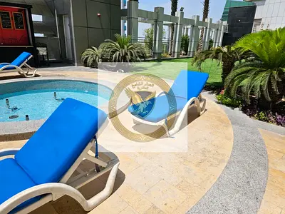 2BR hall with balcony, 2 maid rooms & built-in wardrobes | Free parking, free month, gym, pool, sau
