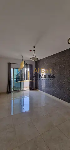 🏡 شركة البيت الملكي للعقارات تقدم لكم شقة غرفتين وصالة مع بلكونة في التعاون – على مخرج دبي مباشرة بإطلالة مفتوحة مميزة 🏡