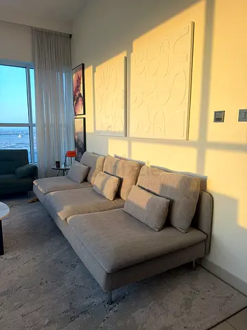Light grey fabric sectional sofa in excellent condition