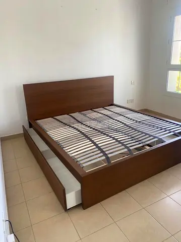 King  wooden bed frame with under-bed drawers — good condition