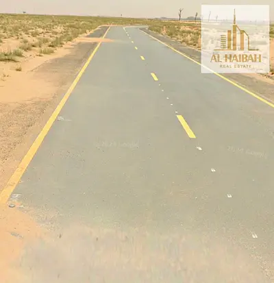 Residential/commercial land for sale in Sharjah, Rawdat Al Qurt, very prime location