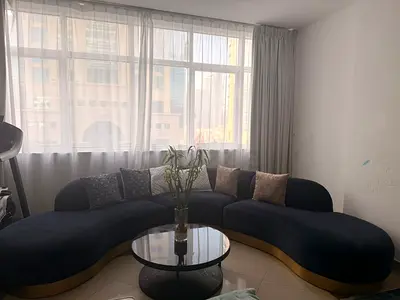 Modern Curved Navy Blue Sofa from Home Center