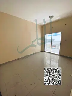 For annual rent in Al Hamidiya: a one-bedroom apartment with a living room and a spacious balcony, f