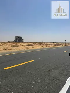 Land for sale in Rawdat Al Qurt area, residential and commercial