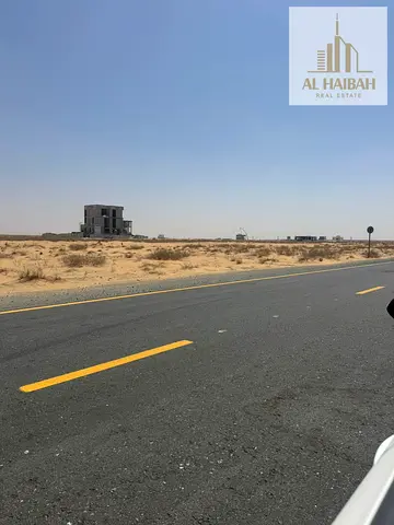 Land for sale in Rawdat Al Qurt area, residential and commercial