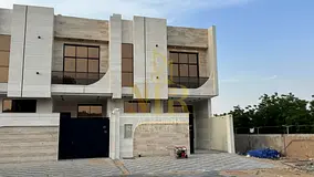 A modern villa located on a main street, including registration fees. Two floors and a rooftop.