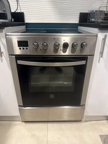 Used stainless steel freestanding electric oven with hob, brand : Hoover