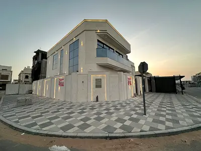 Villa for sale in Al Bahia, Ajman. 5 master bedrooms, majlis, living room with maid's room and spacious kitchen.