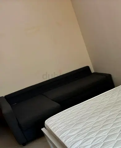 Dark grey 3-seater L shape sofa cum bed - good condition