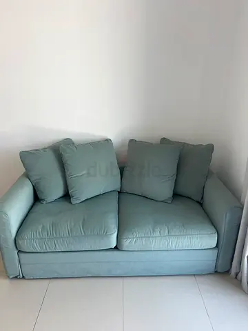 Light Green 2-Seater Sofa — Good Condition