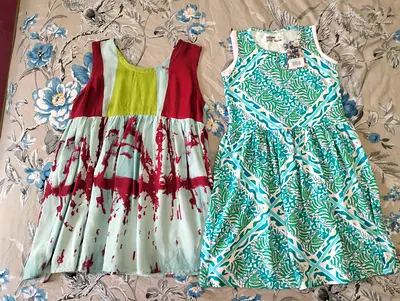 2 brand new never used dresses with tag for 4-6 years old girl both for 40 aed