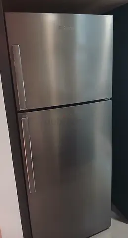 Silver top-freezer refrigerator - good condition