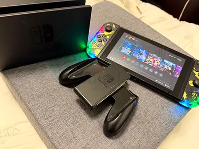 Nintendo Switch with attached LED Joy-Con grips and dock - decent condition(final price )