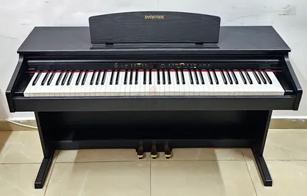 The Dynatone SLP-150 is a compact, 88-key digital piano featuring Natural Hammer Action (NHA) for a